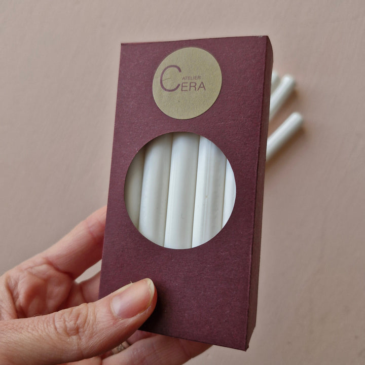 10 pack of Chelsea white sealing wax sticks, 11mm size, in a burgundy box with a circular window. Ideal for glue gun use in office or wedding projects.